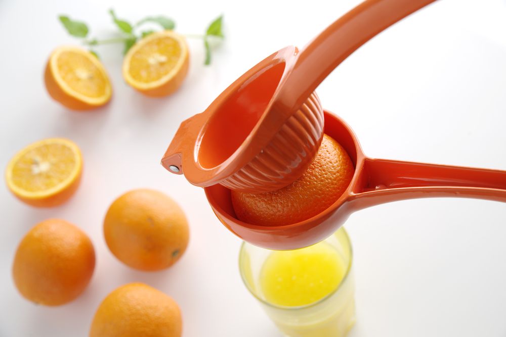 Zitruspresse • orange (für Orangen)
